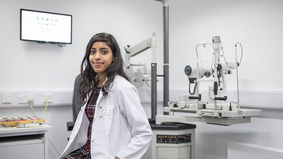 A female optometrist at practice
