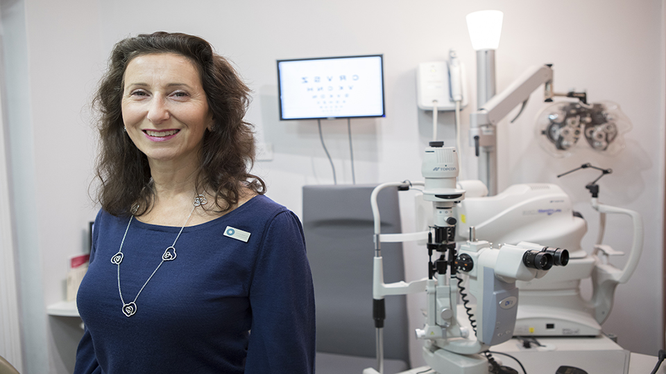 Female optometrist at practice