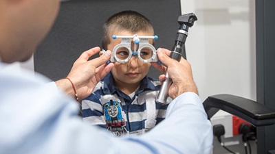 Child having eye test 