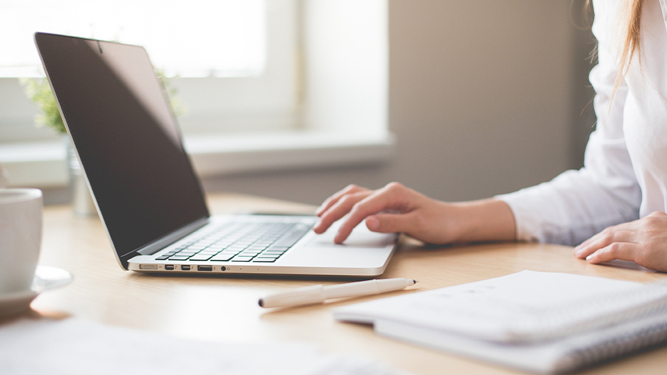 A woman working on laptop