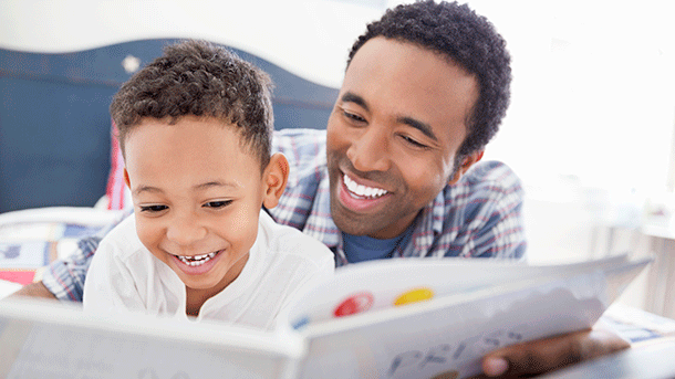 Father and son reading