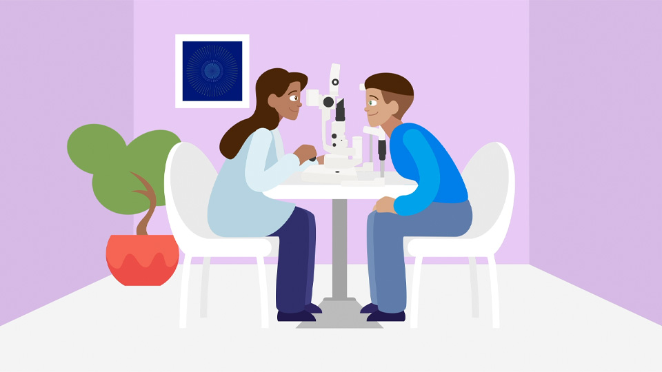 Optometrist examining patient's eyes