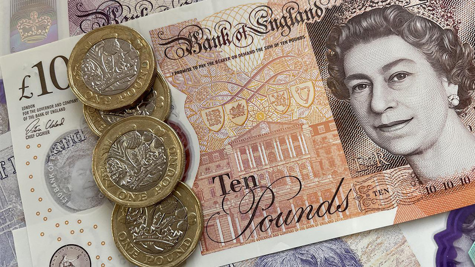 Ten pounds and coins