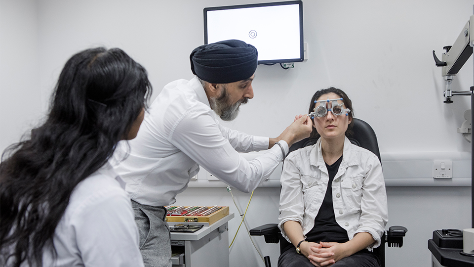 Optometrist with students
