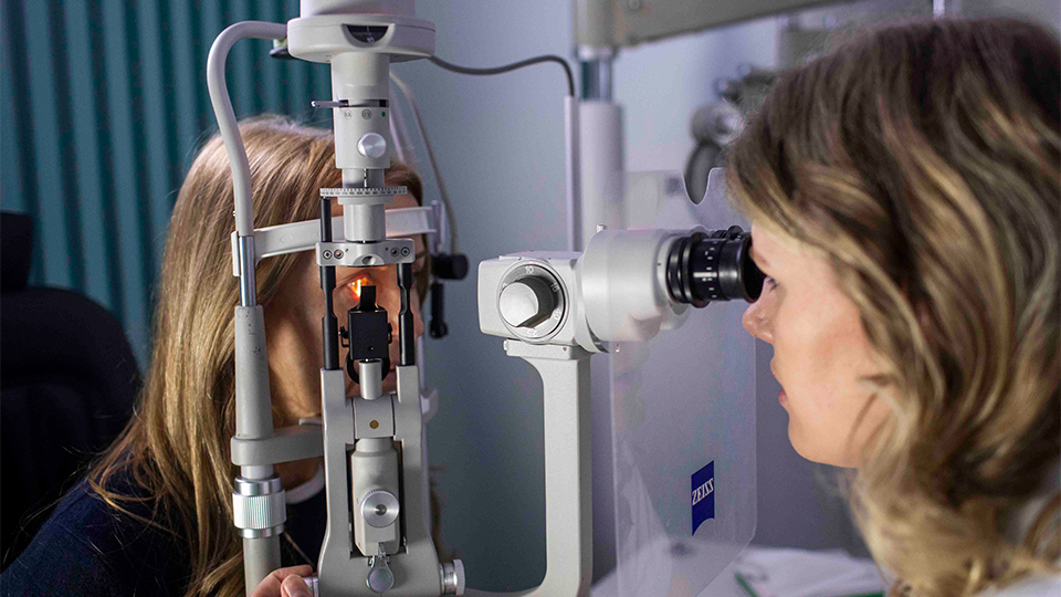 Patient having an eye test