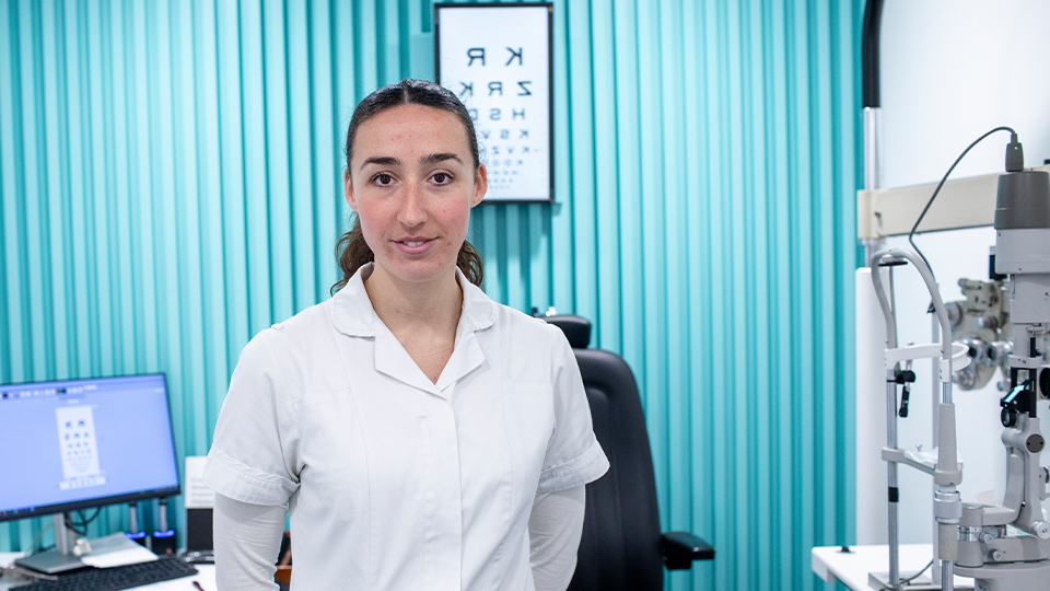 Optometrist at practice