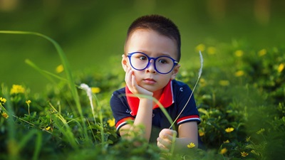 A boy wearing spectacles