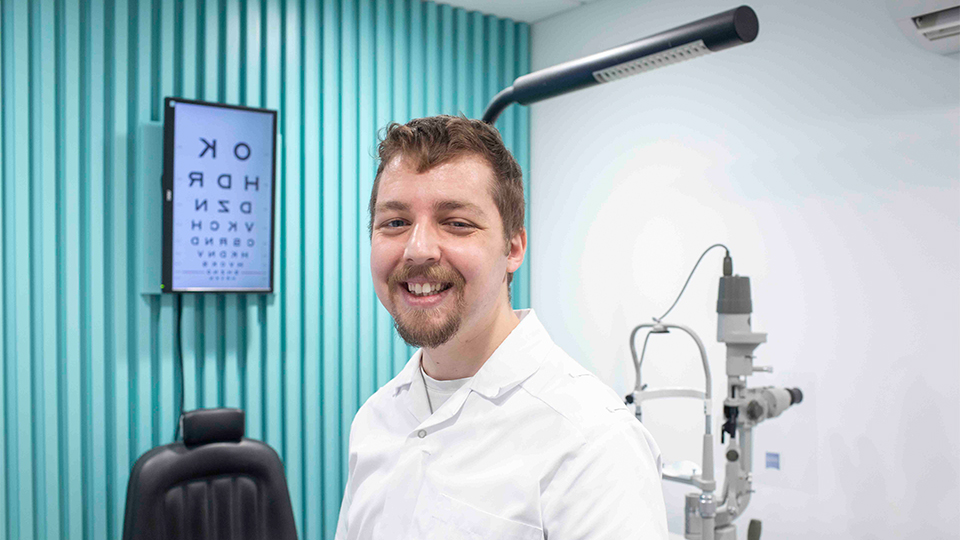 Optometrist at practice