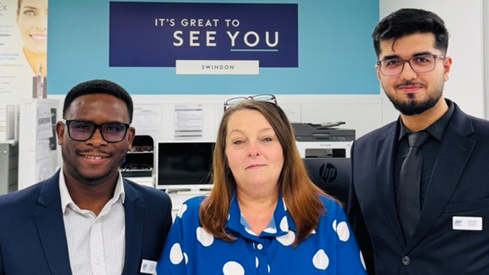 Hassan, Daniel, and Tammy stand together in a Boots Opticians practice