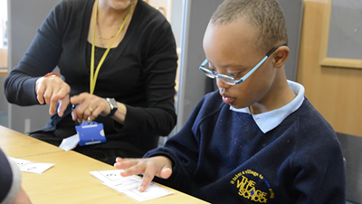 SeeAbility's Children in Focus initiative – a child with special needs receives a sight test