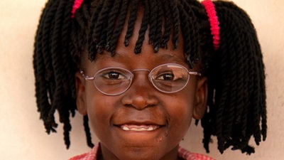 Young girl wearing spectacles
