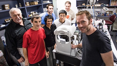 The late Professor Brien Holden  (left) with the BHVI technology team,  including Arthur Ho (third from the right)