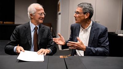 Chief executive officer of Essilor, Hubert Sagnieres, and founder of Luxottica, Leonardo Del Vecchio 