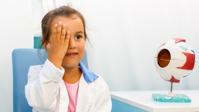 Girl having sight test
