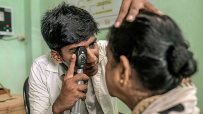 Man performing vision screening