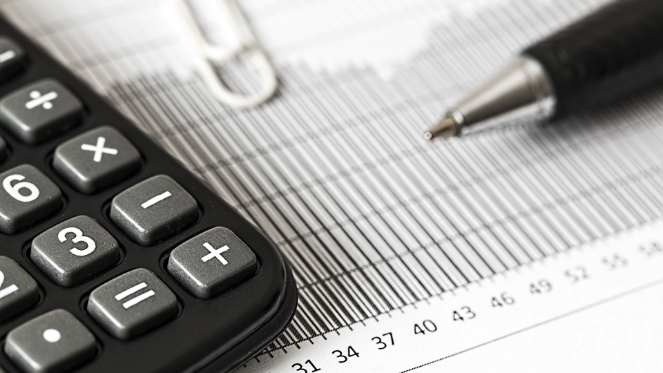 Calculator and pen