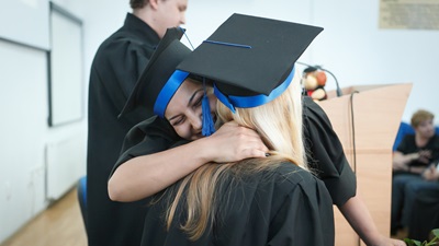 Students hug