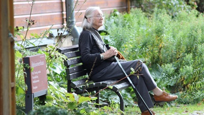 elderly woman on bench