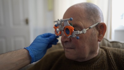 Patient during a domiciliary eye test