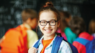 Young child wearing glasses