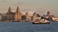 The Ferry across the Mersey and the Liverpool Skyline bathed in the last rays of the setting sun 
