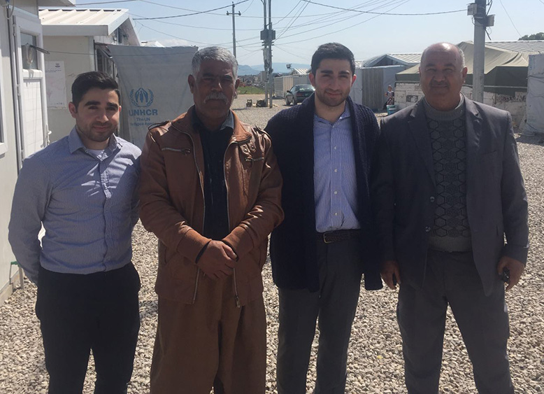 Alan and Dana Hawrami with the refugee camp leaders