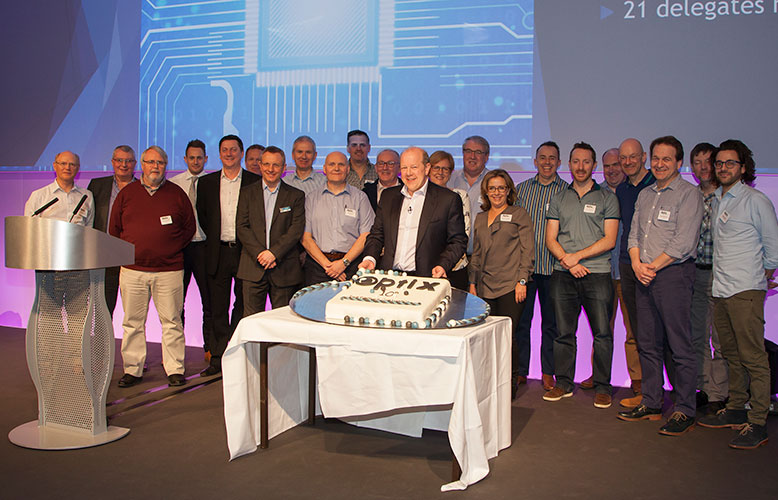 The Optix team celebrate milestone with a cake