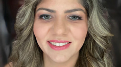 Head and shoulders shot of Sanaa Mikhael smiling