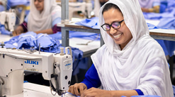 woman working at a sewing machine 