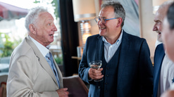 Gary Conway and Daniel Thorn from Millmead Optical Group at the anniversary event
