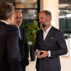 Stephan Hinkerode, head of northern EMEA at Marcolin, is mid-conversation at the grand opening event