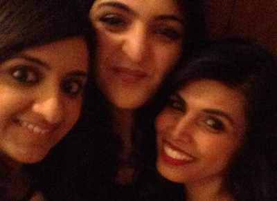 Dr Pretty Basra with friends, including Alka. The photograph is grainy, taken on a phone at a social occasion