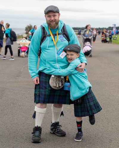 Kieran and Aleks Crosby in their kilts