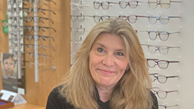 Jo Broad sits inside a practice consulting room