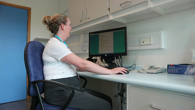 person sitting at desk