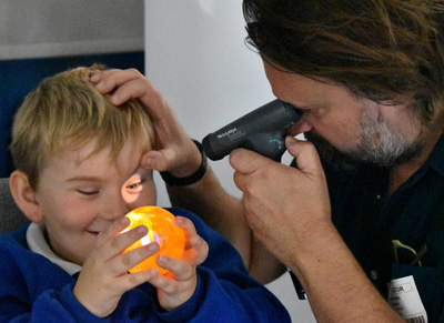 Optometrist Marek Karas and Nathan
