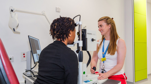 A patient receives a sight test from an optometrist at Sunderland Specialist Eye Hospital