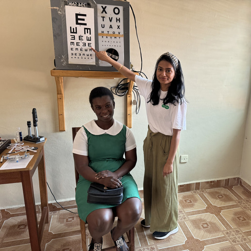 Dharshana testing the vision of a nurse