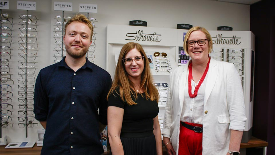 Chris Whiting, External Affairs Officer, Serena Box, Head of Media, PR and External Affairs, and Zoe Franklin visiting Bayfields Opticians
