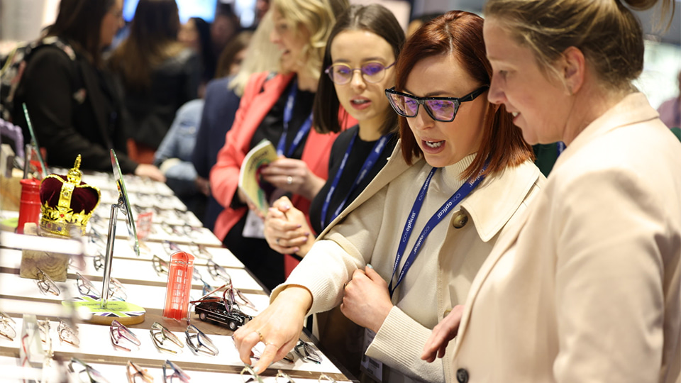 Women looking at some spectacles at 100% Optical