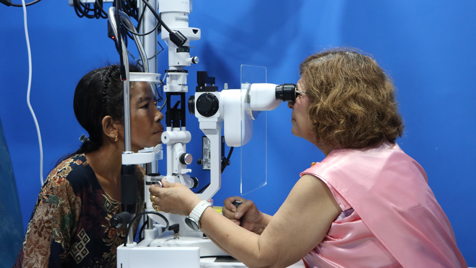 Woman having her sight tested   