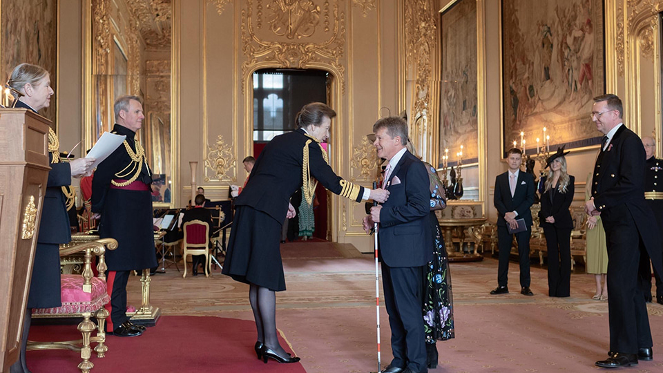 Princess Royal and Robert Nolan during his investiture ceremony at Windsor Castle