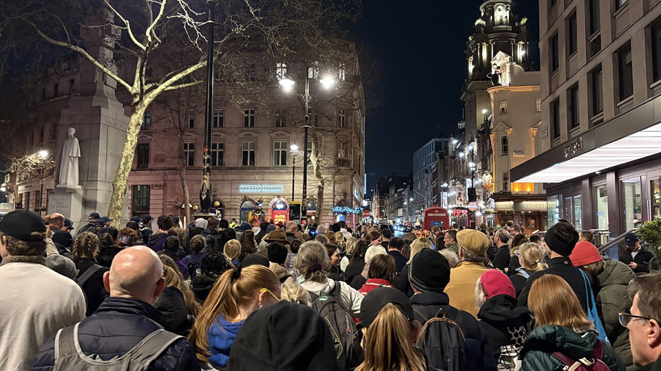 A crowd of people in London getting ready to set off for a charity walk