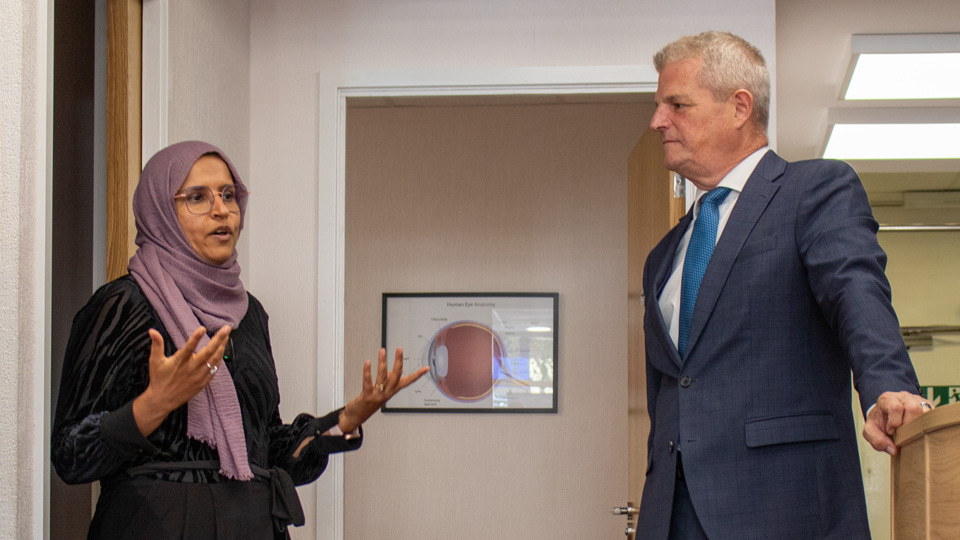 Fatema and Stuart in conversation in the practice