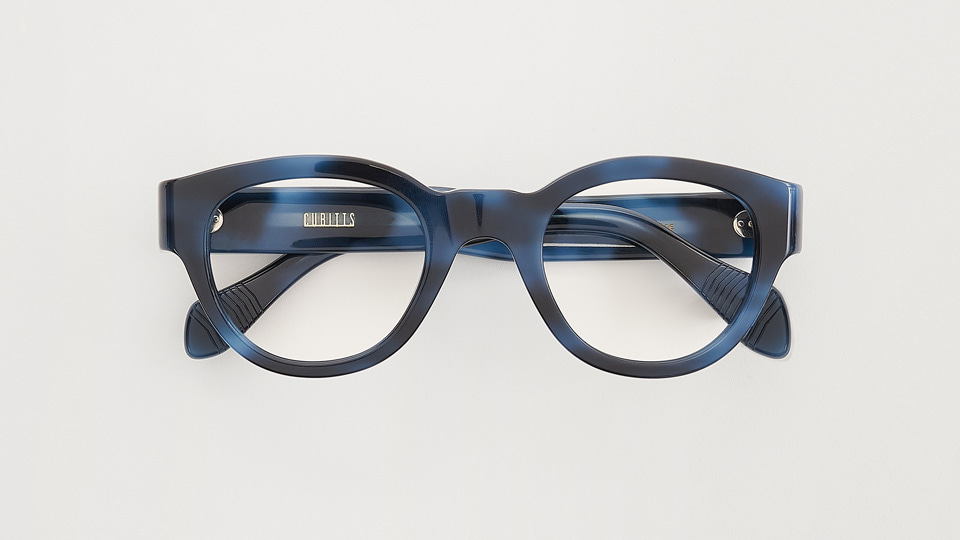 Blue and black Cubitts frames called, Handel. 