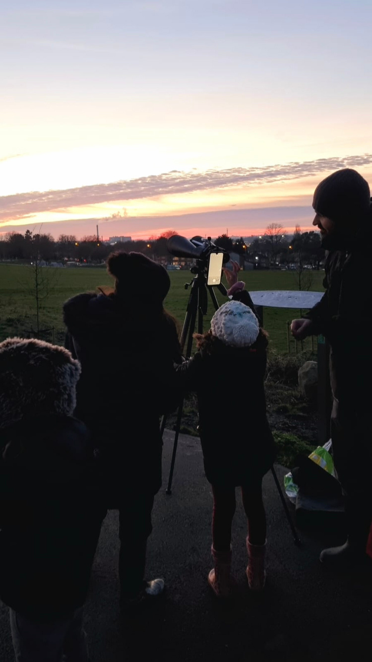 three people and a camera 