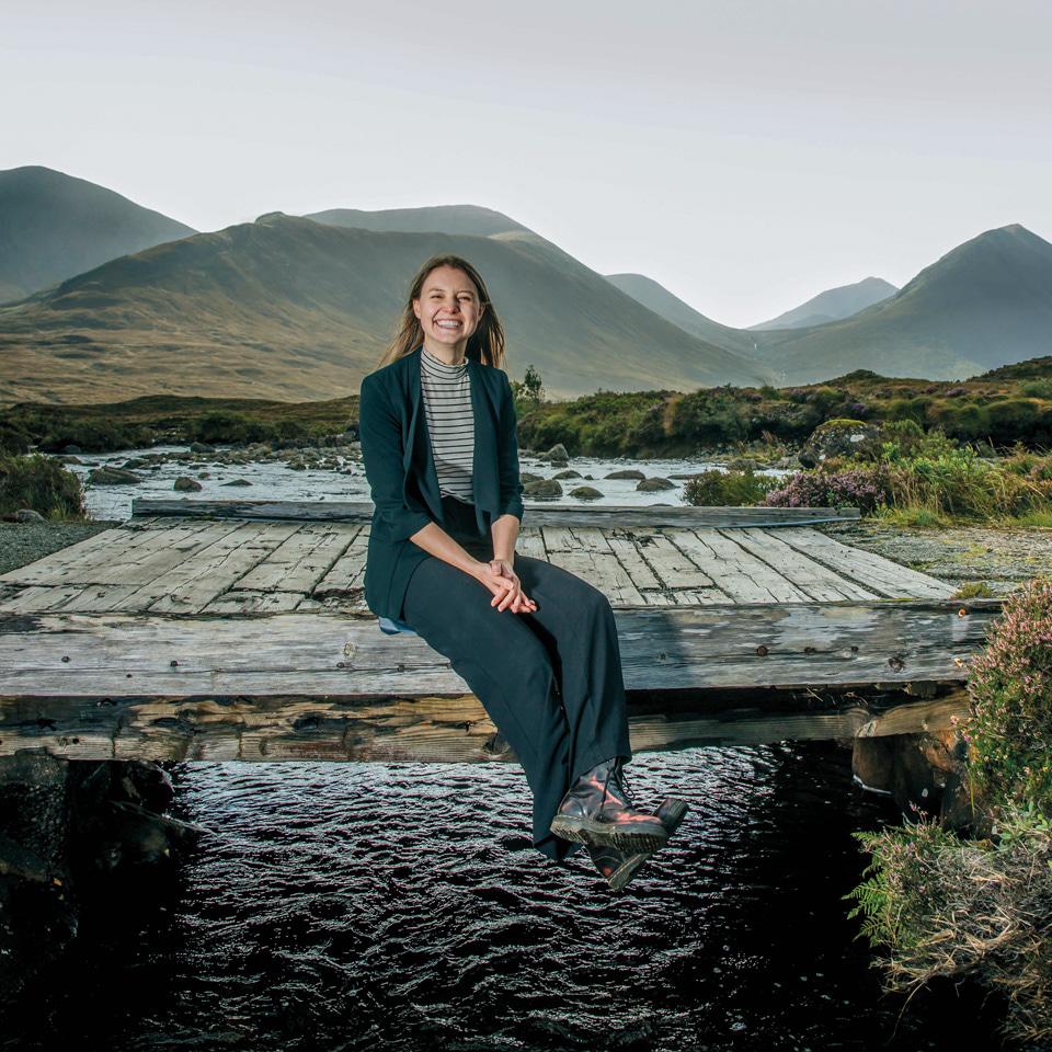 Optometrist Hannah Einarson is photographed smiling on a bridge close to Sligachan on the Isle of Skye