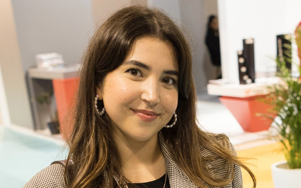 Selin is photographed at an exhibition