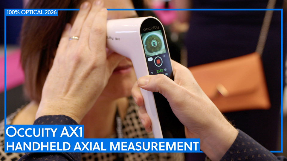 A women receives a measurement of her eye’s axial length from an individual holding a handheld device. The tool looks similar to an in-ear thermometer, with an imaging display and on-screen buttons
