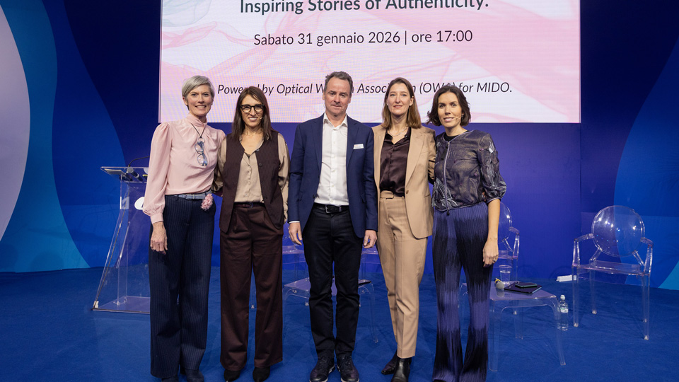A group of panelists gather together on stage at the Mido 2026 event